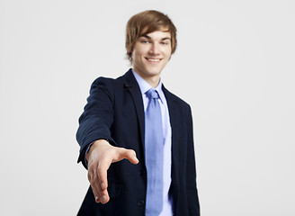 Image showing Businessman giving a handshake