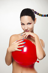 Image showing Fashion woman with a red balloon