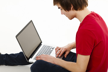 Image showing Man working with a laptop