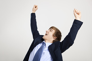Image showing Businessman with arms up