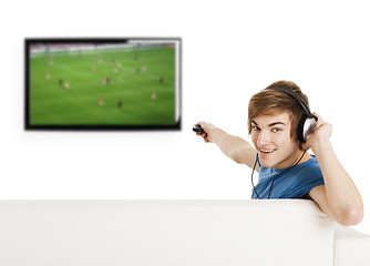 Image showing Watching football on TV