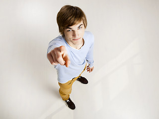 Image showing Young man pointing