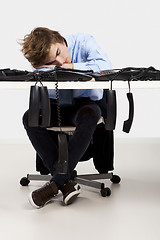 Image showing Tired man in the office