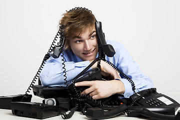 Image showing wrapped in telephones