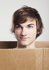 Image showing Man inside a card box