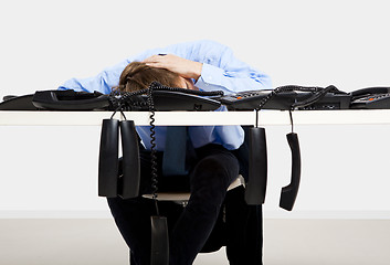 Image showing Tired man in the office