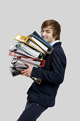 Image showing Business man carrying folders