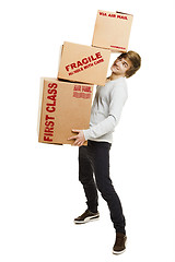 Image showing Man holding card boxes