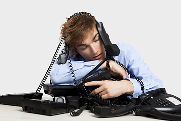 Image showing wrapped in telephones