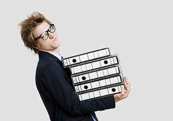 Image showing Business man carrying folders