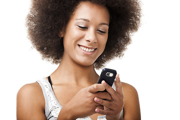 Image showing Beautiful woman at cellphone