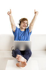 Image showing Happy man on the couch