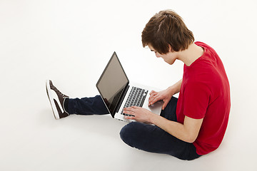 Image showing Man working with a laptop