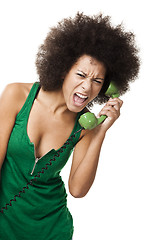 Image showing Angry woman at phone