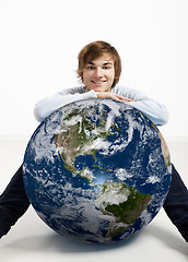 Image showing Young man over the earth