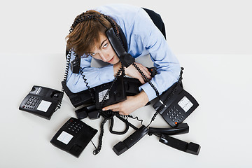 Image showing wrapped in telephones