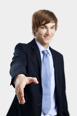 Image showing Businessman giving a handshake