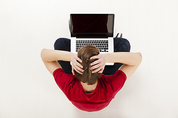 Image showing Man working with a laptop