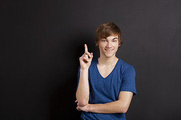 Image showing Young man over a chalk board