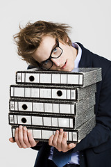 Image showing Business man carrying folders