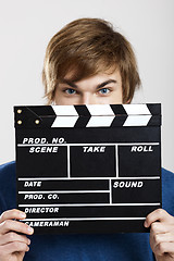 Image showing Showing a clapboard