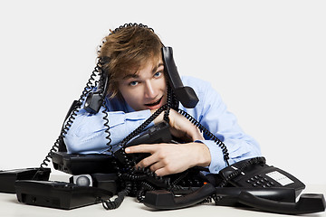 Image showing wrapped in telephones