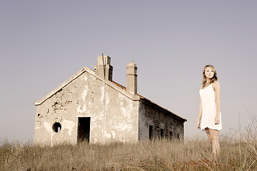 Image showing Woman in a white dress