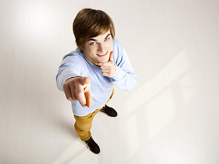 Image showing Young man pointing