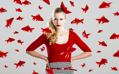 Image showing Fashion woman with red fishes