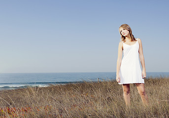 Image showing Woman in a white dress