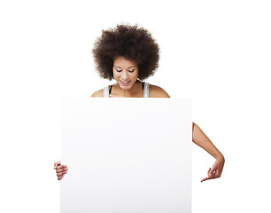 Image showing Woman holding a white billboard