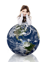 Image showing Girl over the planet earth