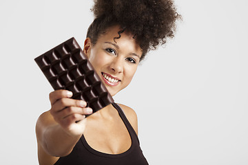 Image showing Woman with a chocolate bar