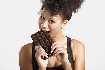 Image showing Woman eating chcolate