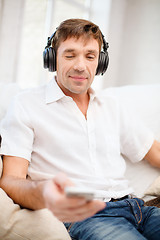 Image showing man with headphones listening to music