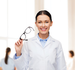 Image showing smiling female doctor with eyeglasses