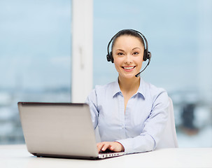 Image showing friendly female helpline operator