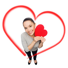 Image showing smiling asian woman with red heart