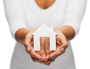 Image showing woman hands with paper house