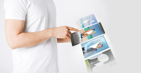 Image showing man with tablet pc watching video