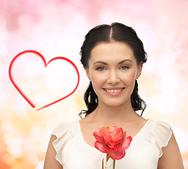 Image showing young and beautiful woman with flower