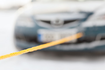 Image showing closeup of towed car with towing rope