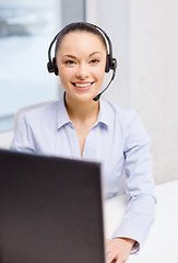 Image showing friendly female helpline operator