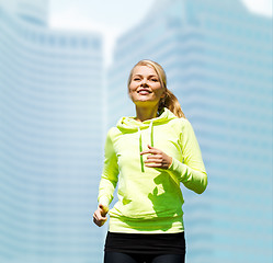 Image showing woman jogging outdoors