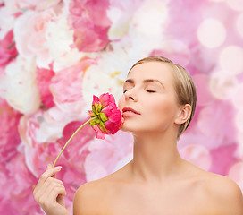 Image showing lovely woman with peonie flower