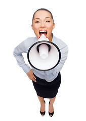 Image showing screaming businesswoman with megaphone