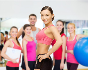 Image showing personal trainer with group in gym