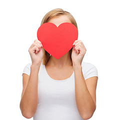 Image showing woman in white t-shirt with heart