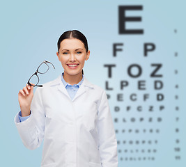 Image showing smiling female doctor without stethoscope