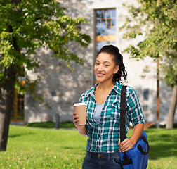 Image showing smiling student with bag and take away coffee cup